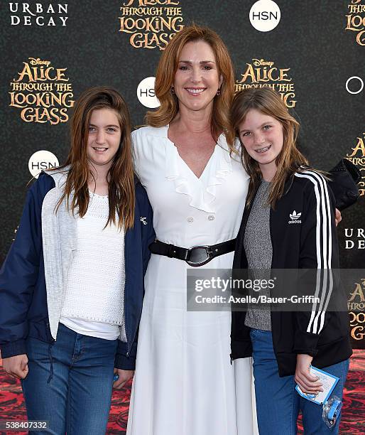 Actress Peri Gilpin and daughters Stella and Ava arrive at the premiere of Disney's 'Alice Through The Looking Glass' at the El Capitan Theatre on...