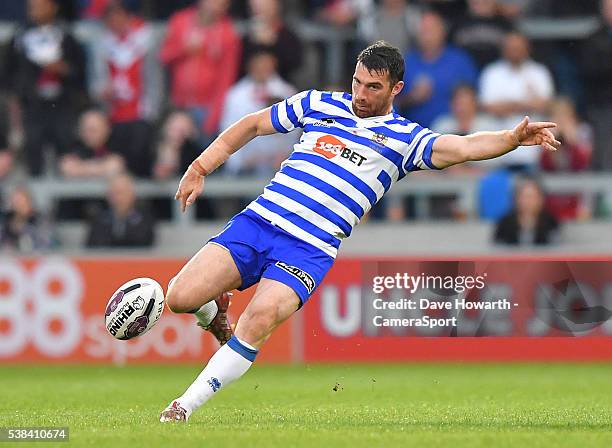 Wigan Warriors' Matty Smith takes a kick during the First Utility Super League Round 17 match between Salford Red Devils and Wigan Warriors at the AJ...