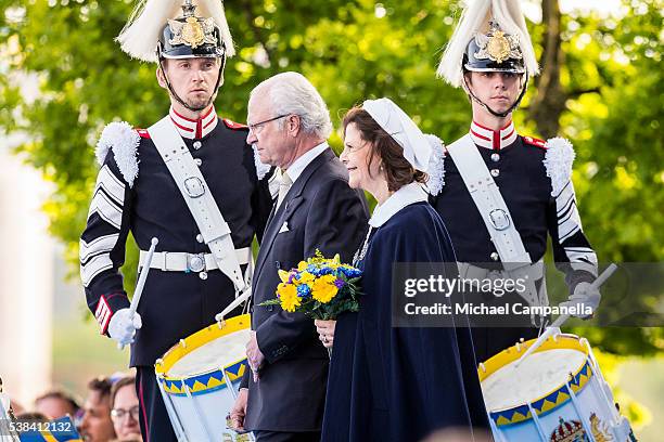 King Carl XVI Gustaf and Queen Silvia of Sweden depart a ceremony celebrating Sweden's national day at Skansen on June 6, 2015 in Stockholm, Sweden.