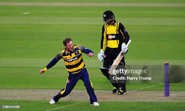 Colin Ingram of Glamorgan celebrates after dismissing Jack Taylor of Gloucestershire during the Royal London One Day Cup match between Glamorgan and...