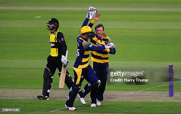 Colin Ingram of Glamorgan celebrates after dismissing Jack Taylor of Gloucestershire during the Royal London One Day Cup match between Glamorgan and...