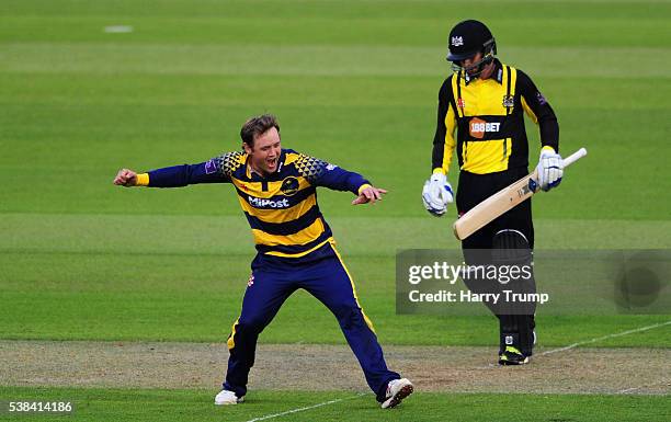 Colin Ingram of Glamorgan celebrates after dismissing Jack Taylor of Gloucestershire during the Royal London One Day Cup match between Glamorgan and...