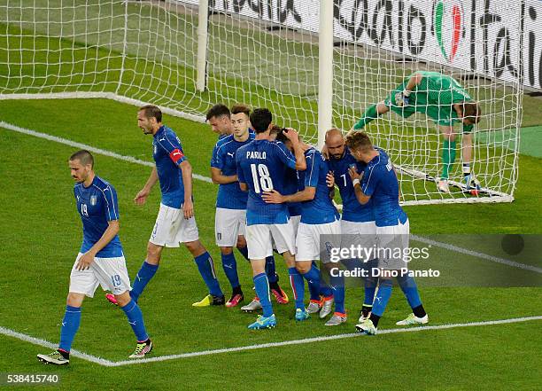 Antonio Candreva of Italy celebrates after scoring his opening goal from the penalty spot during the international friendly match between Italy and...