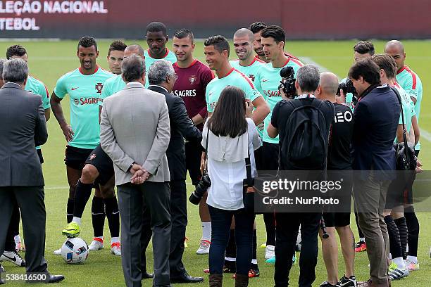 Portugal's forward Cristiano Ronaldo with Portugal's Prime Minister Antonio Costa during a Portugal training session in preparation for Euro 2016 at...