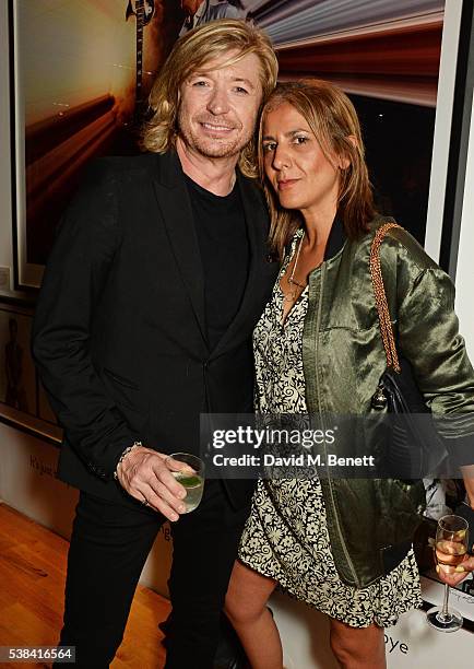 Nicky Clarke and Azzi Glasser attend a private view of new exhibition 'David Bowie: Fame, Fashion, Photography' at The Hub on June 6, 2016 in London,...