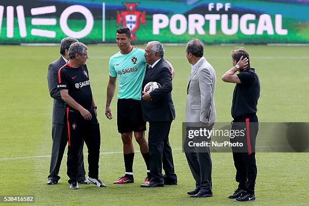 Portugal's forward Cristiano Ronaldo with Portugal's Prime Minister Antonio Costa during a Portugal training session in preparation for Euro 2016 at...