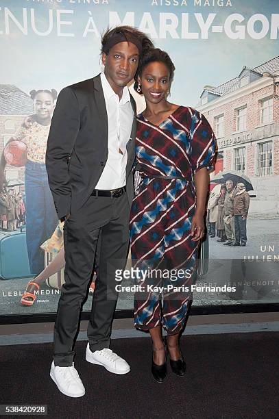 Aissa Maiga and Kamini Zantoko attend the "Bienvenue A Marly Gomont" Paris Premiere at the UGC Cine Cite Bercy on June 6, 2016 in Paris, France.
