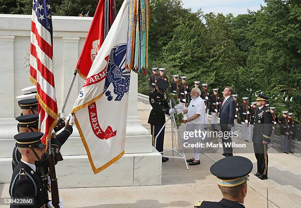 Indian Prime Minister Narendra Modi , lays a wreath at the Tomb of the Unknown Soldier, while flanked by US Defense Secretary Ash Carter at Arlington...