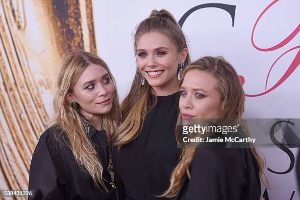 Elizabeth Olsen and Mary-Kate and Ashley Olsen attend the 2016 CFDA Fashion Awards at the Hammerstein Ballroom on June 6, 2016 in New York City.