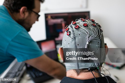Experiment with Brain-Computer Interface (BCI) in neuroscience laboratory Experiment with Brain-Computer Interface (BCI) in neuroscience laboratory