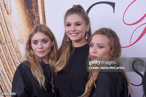 Elizabeth Olsen and Mary-Kate and Ashley Olsen attend the 2016 CFDA Fashion Awards at the Hammerstein Ballroom on June 6, 2016 in New York City.