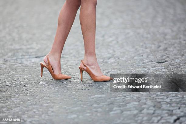 Sarah Benziane , is wearing Texto nude shoes, during a street style session on June 06, 2016 in Paris, .