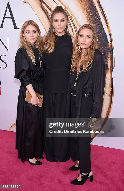 Elizabeth Olsen and Mary-Kate and Ashley Olsen attend the 2016 CFDA Fashion Awards at the Hammerstein Ballroom on June 6, 2016 in New York City.