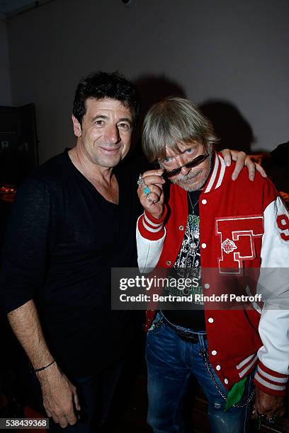 Singers Patrick Bruel and Renaud Sechan pose after the Concert of Patrick Bruel at Theatre Du Chatelet on June 6, 2016 in Paris, France.