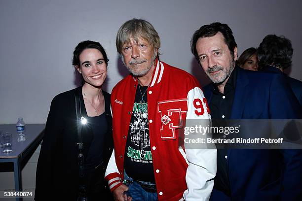 Singer Renaud Sechan standing between actor Jean-Hugues Anglade and his wife Charlotte attend the Concert of Patrick Bruel at Theatre Du Chatelet on...