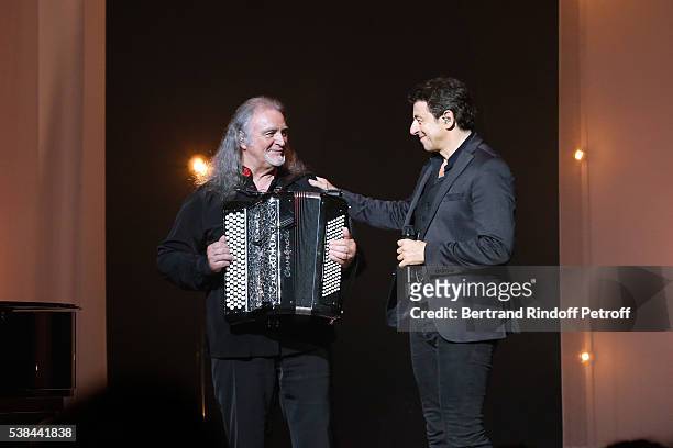 Musician Roland Romanelli and singer Patrick Bruel perform during the Concert of Patrick Bruel at Theatre Du Chatelet on June 6, 2016 in Paris,...