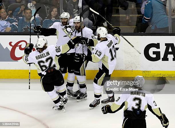 Eric Fehr of the Pittsburgh Penguins celebrates with his teammates after scoring in the third period of Game Four of the 2016 NHL Stanley Cup Final...