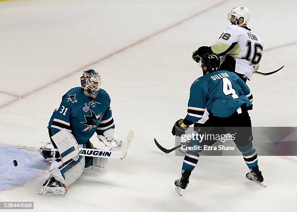 Martin Jones of the San Jose Sharks allows a goal to Eric Fehr of the Pittsburgh Penguins in the third period of Game Four of the 2016 NHL Stanley...