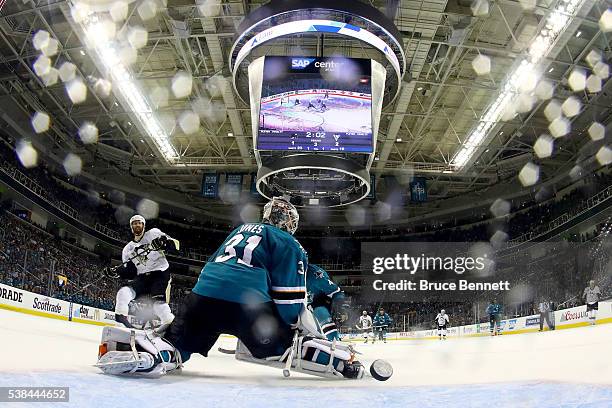 Martin Jones of the San Jose Sharks allows a goal to Eric Fehr of the Pittsburgh Penguins in the third period of Game Four of the 2016 NHL Stanley...