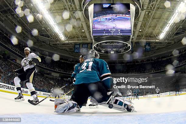 Martin Jones of the San Jose Sharks allows a goal to Eric Fehr of the Pittsburgh Penguins in the third period of Game Four of the 2016 NHL Stanley...