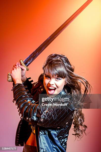 formidable female warrior - hand sword stock pictures, royalty-free photos & images