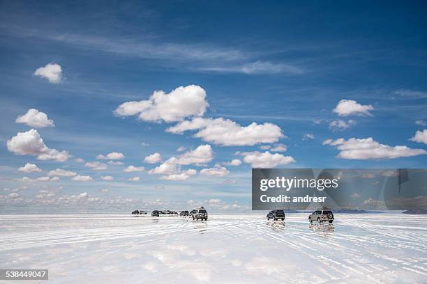 cars at the desert - uyuni stock pictures, royalty-free photos & images