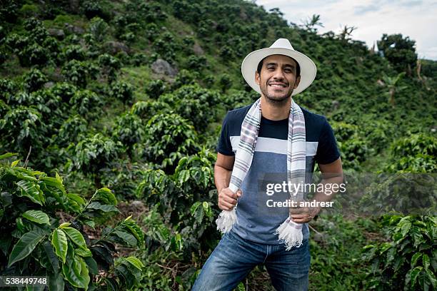 young man working at a colombian coffee farm - colombian culture stock pictures, royalty-free photos & images