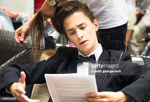 actor practising script backstage - scenario stockfoto's en -beelden