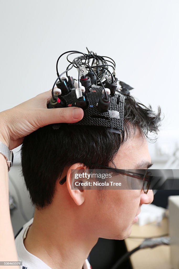 Brain monitoring head piece on patients head