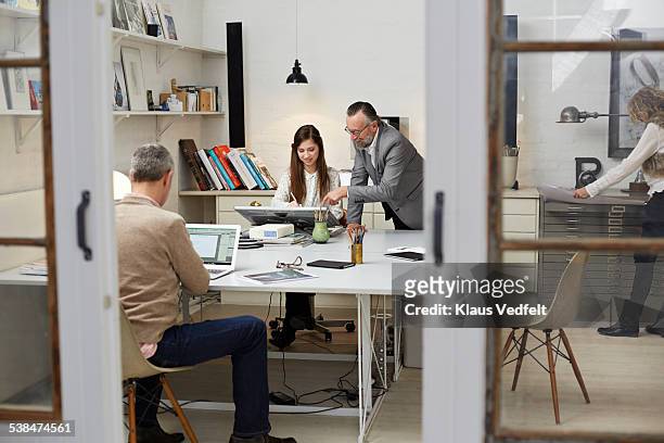 3 generations working at small design agency - open day 4 stock pictures, royalty-free photos & images