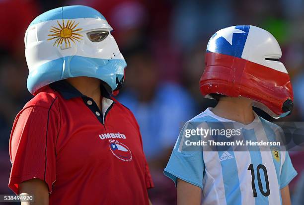 Two fans looks on from the stands prior to the start of the game during the 2016 Copa America Centenario Group match play between Argentina and Chile...
