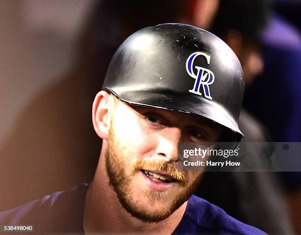 Trevor Story of the Colorado Rockies reacts after his three run homerun to take a 6-1 lead over the Los Angeles Dodgers during the sixth inning at...