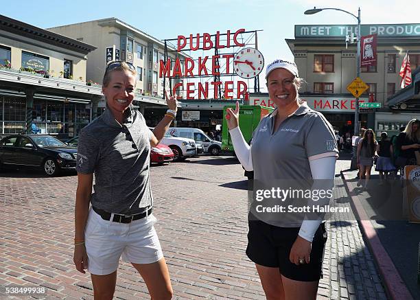 Players Brittany Lincicome and Kris Tamulis make a visit to the Pike Place Market prior to the start of the KPMG Women's PGA Championship at the...