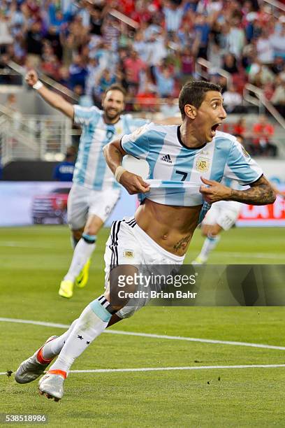 Angel Di Maria of Argentina celebrates after scoring the opening goal during a group D match between Argentina and Chile at Levi's Stadium as part of...