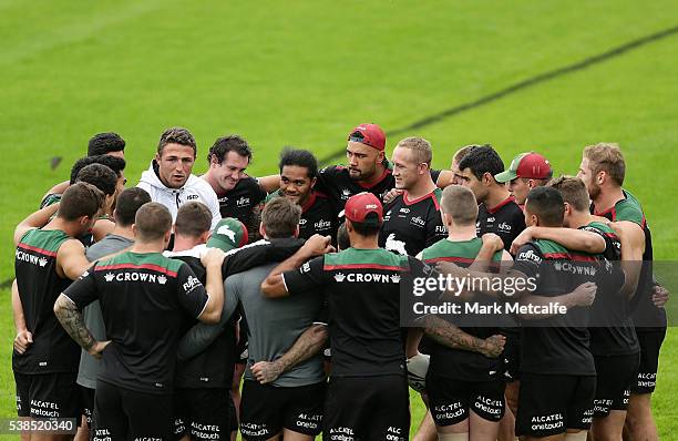 Sam Burgess talks to team mates in a huddle during a South Sydney Rabbitohs training session at Redfern Oval on June 7, 2016 in Sydney, Australia.