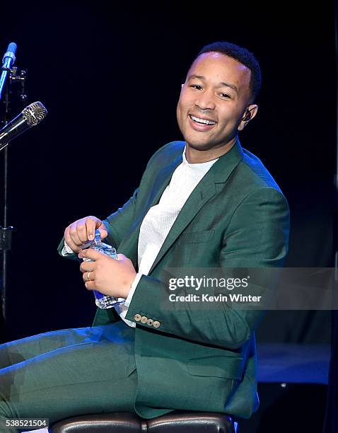 Musician John Legend performs onstage during the "Hillary Clinton: She's With Us" concert at The Greek Theatre on June 6, 2016 in Los Angeles,...