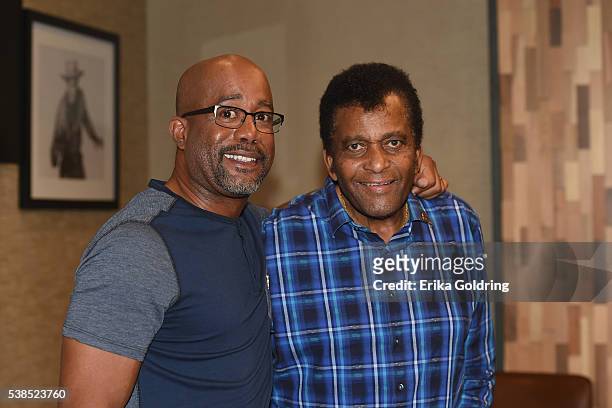 Darius Rucker and Charley Pride pause for a photo during the 7th annual "Darius and Friends" concert at Wildhorse Saloon on June 6, 2016 in...