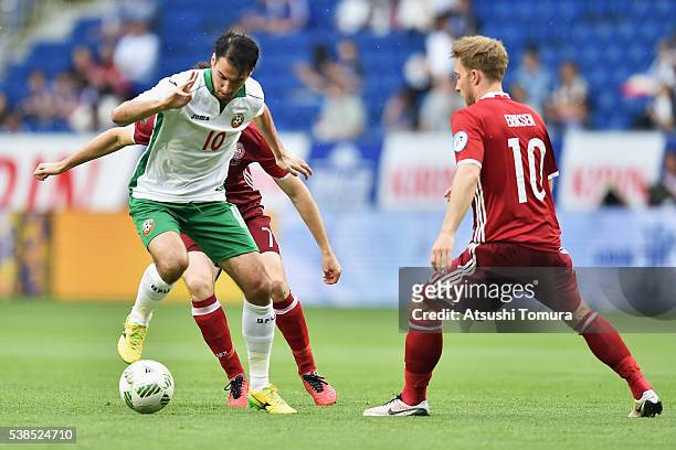 Ivelin Popov of Bulgaria controls the ball under pressure of William Kvist and Christian Eriksen of Denmark during the international friendly match...