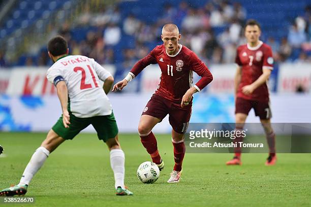 Viktor Fischer of Denmark and Svetoslav Dyakov of Bulgaria compete for the ball during the international friendly match between Denmark and Bulgaria...