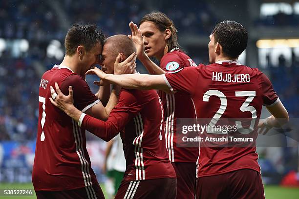 Danish players celebrate their team's first goal during the international friendly match between Denmark and Bulgaria at the Suita City Football...