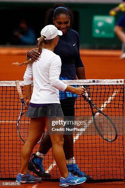 Player Serena Williams and Kazakhstan's Yulia Putintseva after women's quarter-final match at the Roland Garros 2016 French Tennis Open in Paris on...