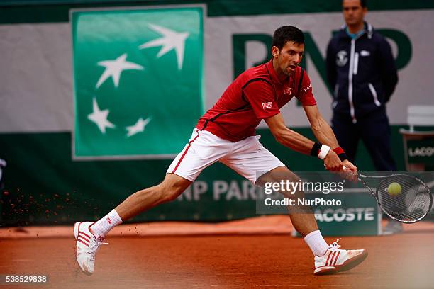 Novak Djokovic of Serbia in action during his men's singles match against Roberto Bautista Agut of Spain during the Roland Garros French Tennis Open...