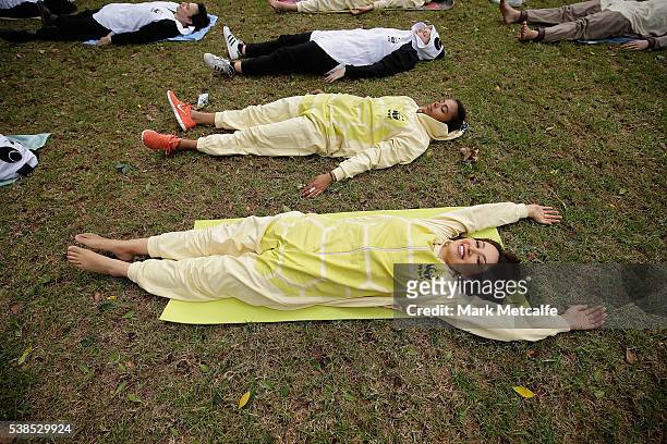 Dayanna Grageda, Miss Earth Australia particpates in a Yoga class at Hyde Park on June 7, 2016 in Sydney, Australia. The yoga class was held to raise...