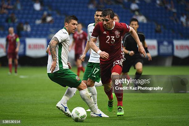 Pierre-Emile Hojbjerg of Denmark and Ivo Ivanov of Bulgaria compete for the ball during the international friendly match between Denmark and Bulgaria...