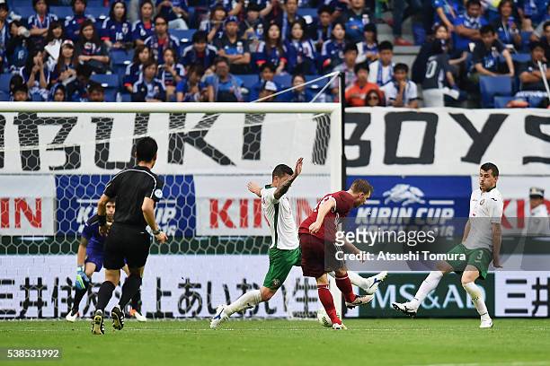 Christian Eriksen of Denmark scores his team's third goal during the international friendly match between Denmark and Bulgaria at the Suita City...