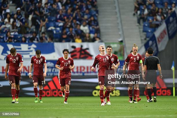 Denmark players celebrate their team's fourth goal during the international friendly match between Denmark and Bulgaria at the Suita City Football...