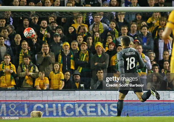 Goalkeeper Adam Federici of Australia watches as the ball goes over his head and into the goal after Giannis Maniatis of Greece kicked a goal from...