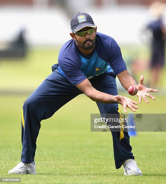 Lahiru Thirimanne of Sri Lanka catches during a nets session ahead of the 1st Investec Test match between England and Sri Lanka at Lord's Cricket...