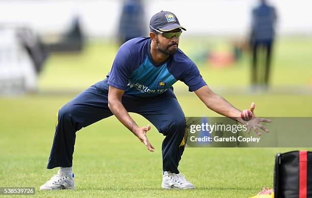 Lahiru Thirimanne of Sri Lanka catches during a nets session ahead of the 1st Investec Test match between England and Sri Lanka at Lord's Cricket...