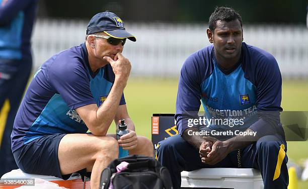 Angelo Mathews of Sri Lanka speaks with coach Graham Ford during a nets session ahead of the 1st Investec Test match between England and Sri Lanka at...